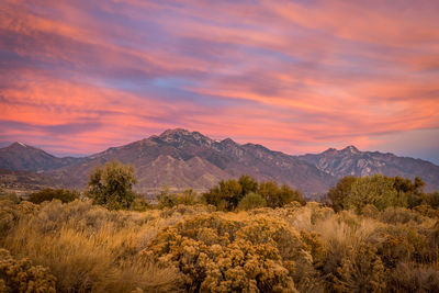 Scenic view of mountains against sky during sunset