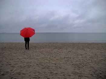 People standing on beach