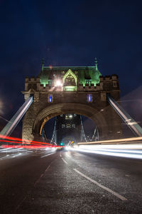 Light trails on bridge at night