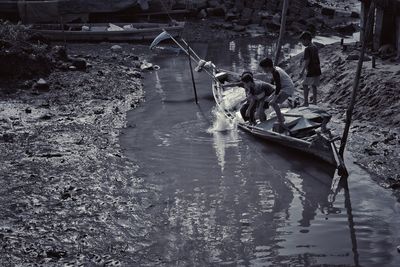 People working in river