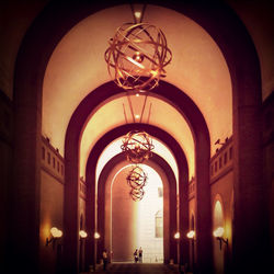 Low angle view of illuminated ceiling
