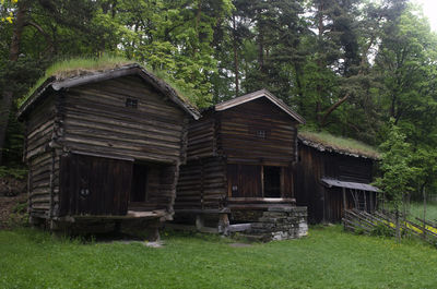 Old house on grassy field