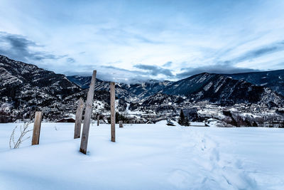 Scenic view of snowcapped mountains against sky