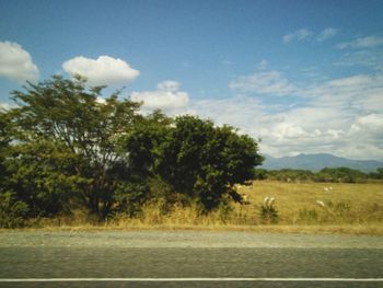 Country road passing through landscape