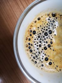 High angle view of coffee cup on table