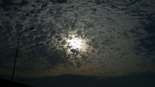 Scenic view of cloudy sky at sunset