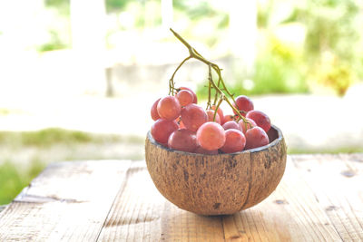 Close-up of fruits in bowl on table