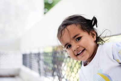 Close-up portrait of smiling boy