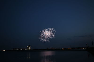 Firework display at night