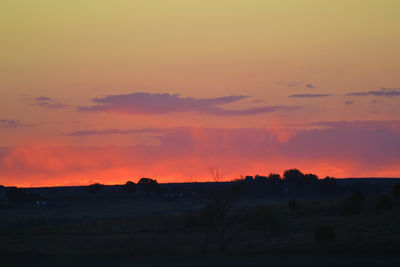 Scenic view of dramatic sky during sunset