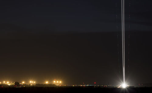View of illuminated street light at night