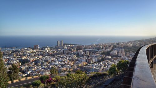 Cityscape against blue sky