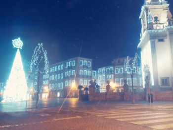 View of illuminated buildings at night