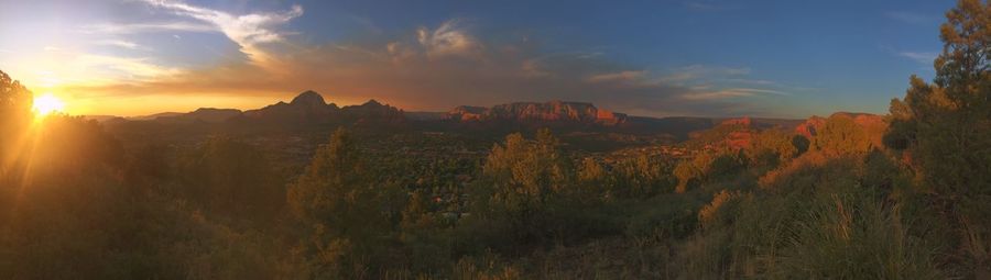 Panoramic view of landscape against sky during sunset