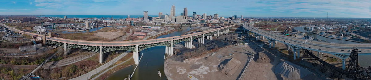 High angle view of bridge in city against sky