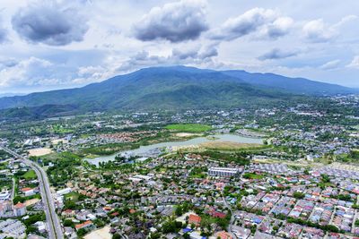 Aerial view of townscape against sky