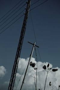 Low angle view of electricity pylon
