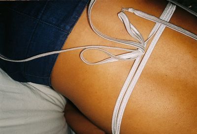 Midsection of woman with iv drip