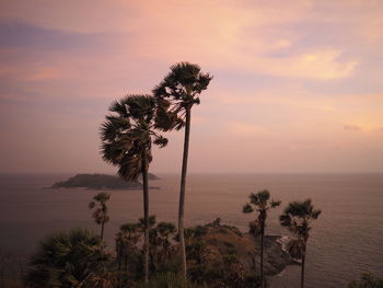 Scenic view of sea against sky at sunset