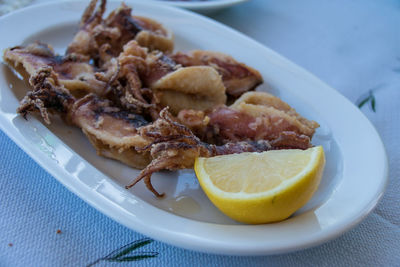 Close-up of fish served in plate