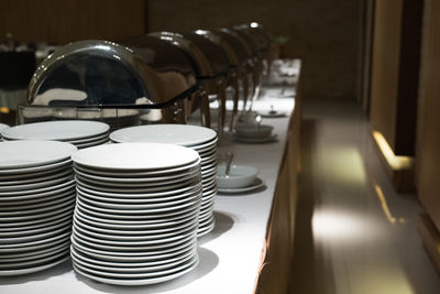 Close-up of wine glasses on table in restaurant