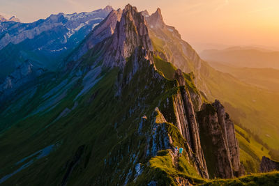 Scenic view of mountains against sky during sunset