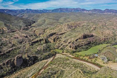 High angle view of road amidst landscape against sky