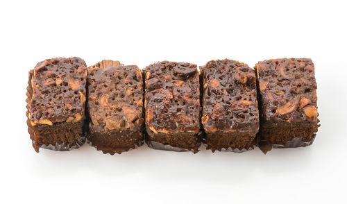 Close-up of chocolate cake against white background