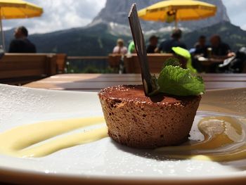 Close-up of dessert in plate on sunny day