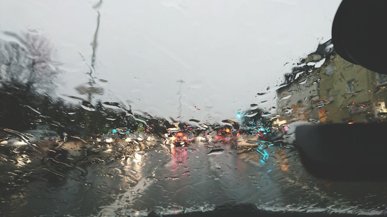 water, wet, drop, rain, transparent, window, indoors, glass - material, lifestyles, raindrop, leisure activity, weather, car, season, monsoon, reflection, transportation, vehicle interior