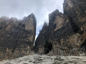 Panoramic view of rocky mountains against sky