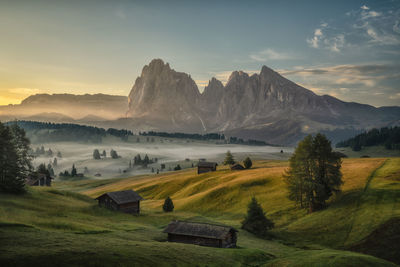 Scenic view of landscape and mountains against sky