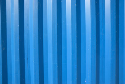 Full frame shot of blue metal fence