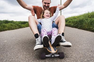 Father with child on road