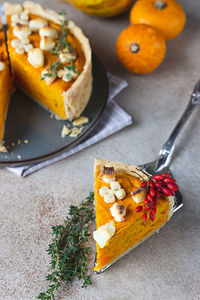 Thanksgiving day pumpkin, feta and thyme pie. fall traditional pumpkin pie for autumn holiday. 