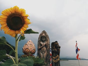 Close-up of statue against sky