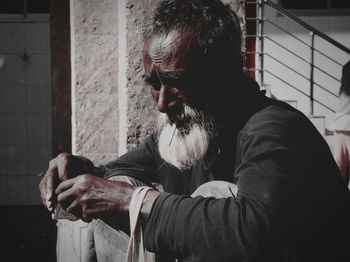 Side view of young man looking away