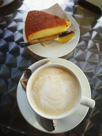 Close-up of cappuccino on table