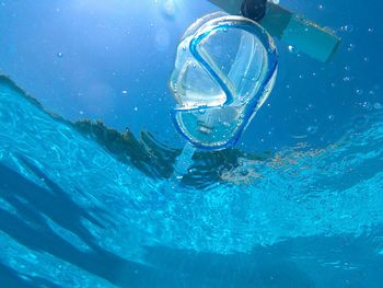 Close-up of scuba mask in sea