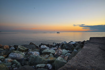 Scenic view of sea against sky during sunset
