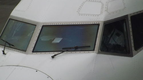 Low angle view of airplane window