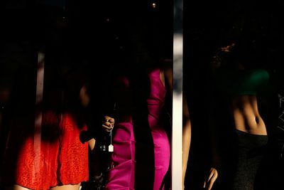 Full length of woman dancing at night