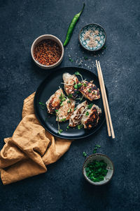 High angle view of dumplings in plate on table