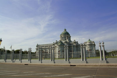 View of historical building against cloudy sky