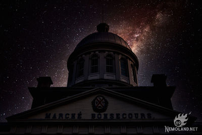 Low angle view of building against sky at night