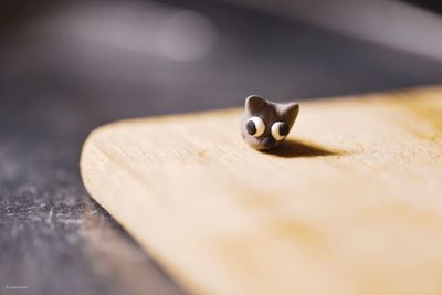 Close-up of love on cutting board on table