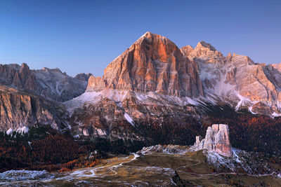 Rock formations on mountain against sky