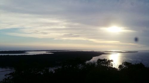 Scenic view of sea against sky at sunset