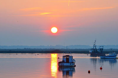 Scenic view of sunset over sea