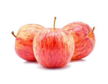 Close-up of apples against white background